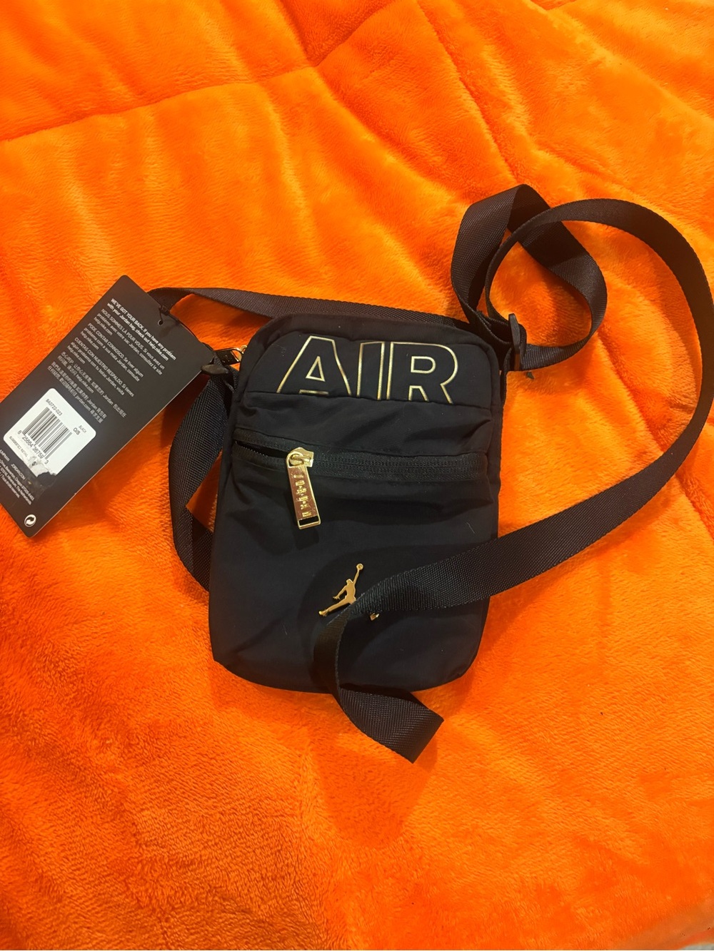 Nike Air Small Crossbody Bag in Black and Gold